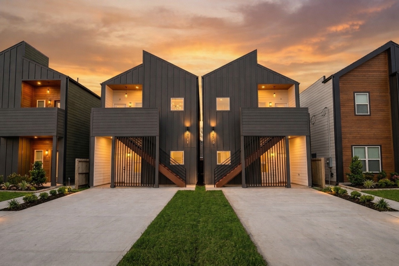 IMG Properties shared-wall duplex at dusk